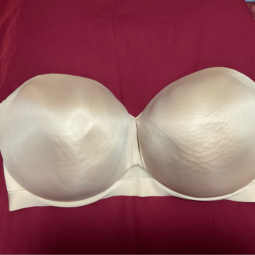Cacique strapless bra size 42J cream in color